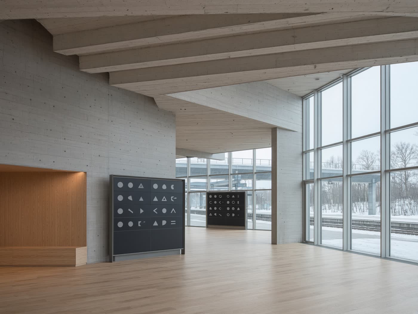 Pale concrete concourse of a contemporary Nordic train station in winter light